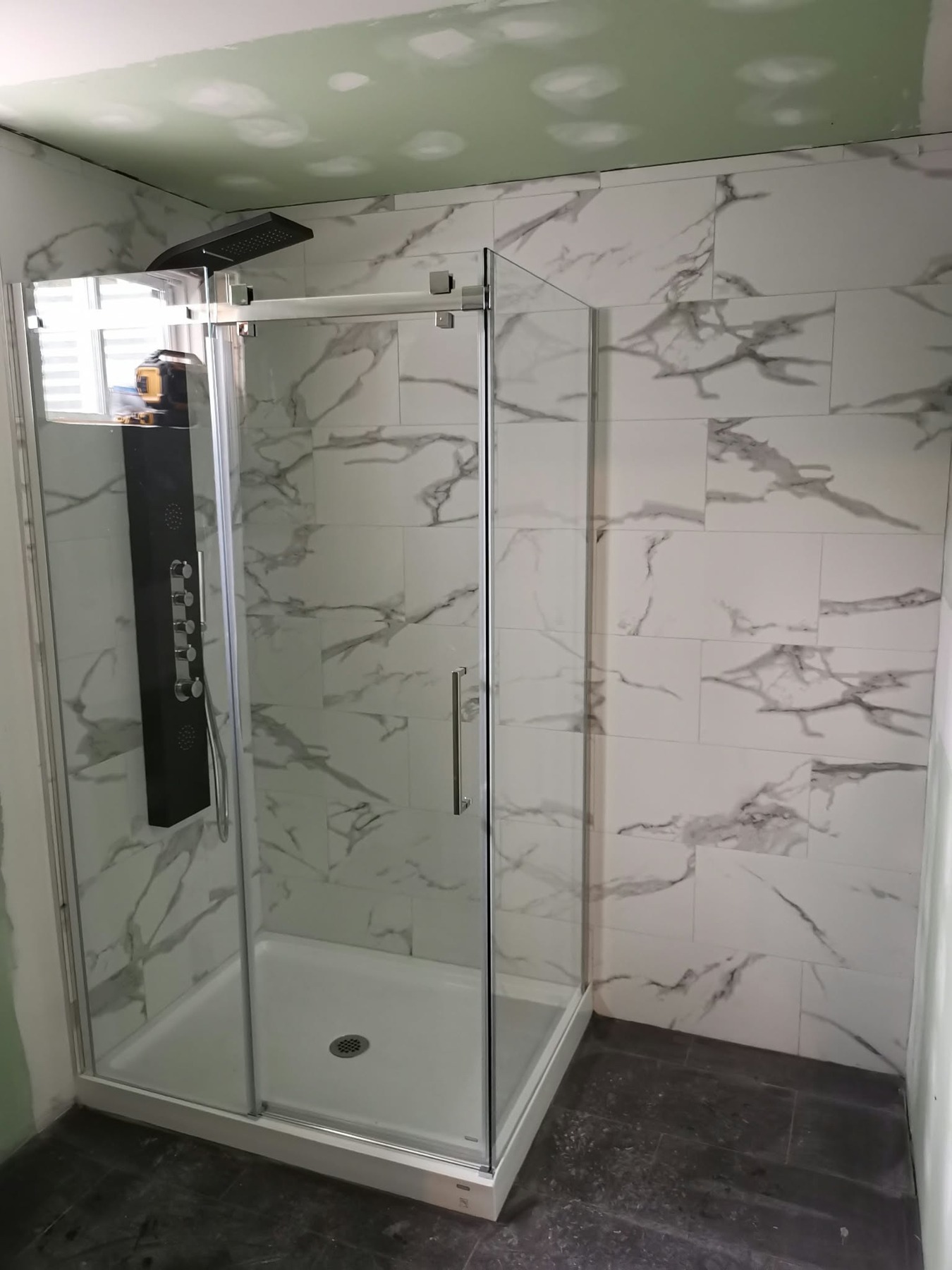 Marble-look tiled shower